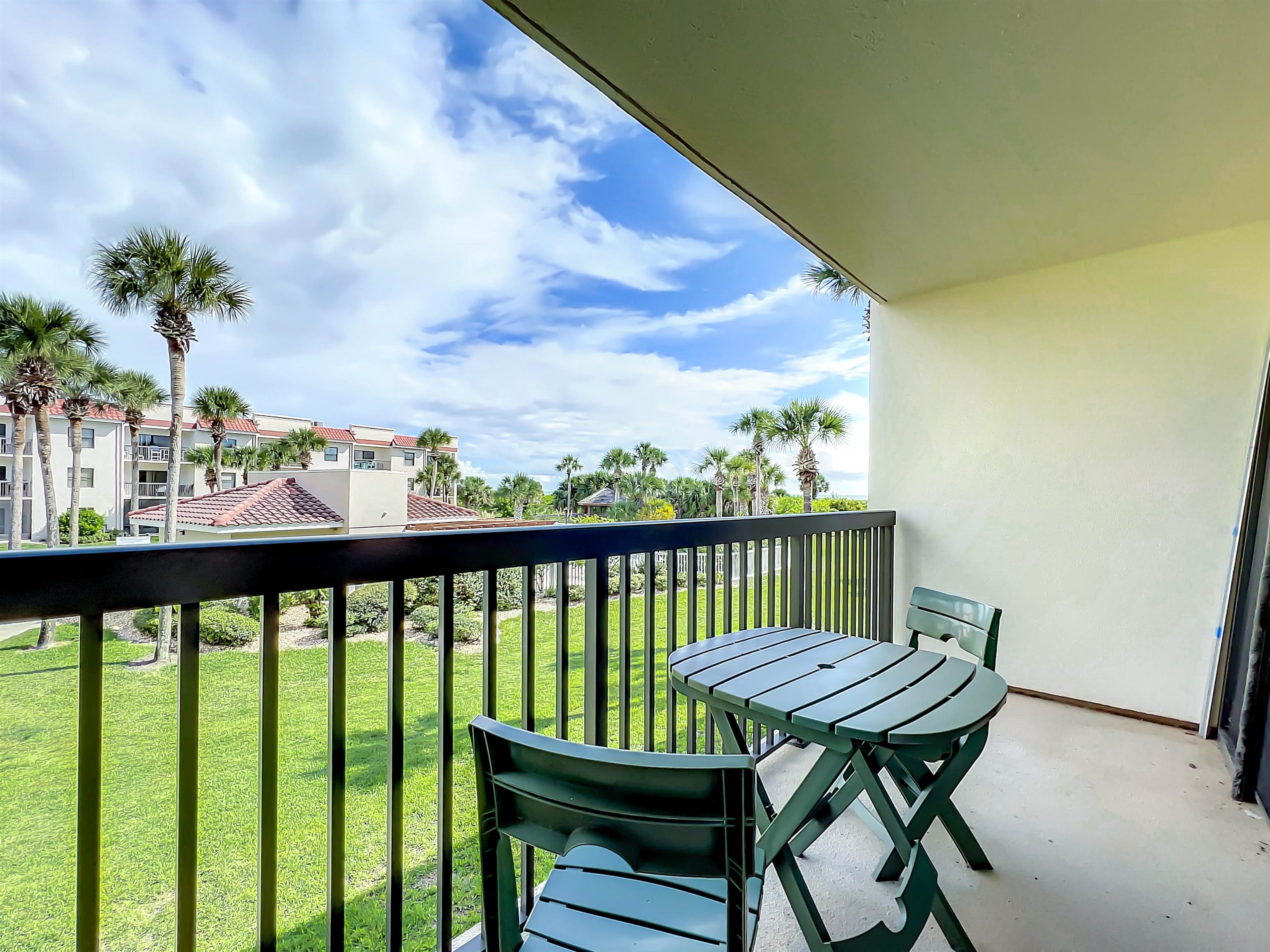 4250 A1A South, Unit O23 St. Augustine, FL 32080 - Photo 12 of 38 a view of a balcony with chairs