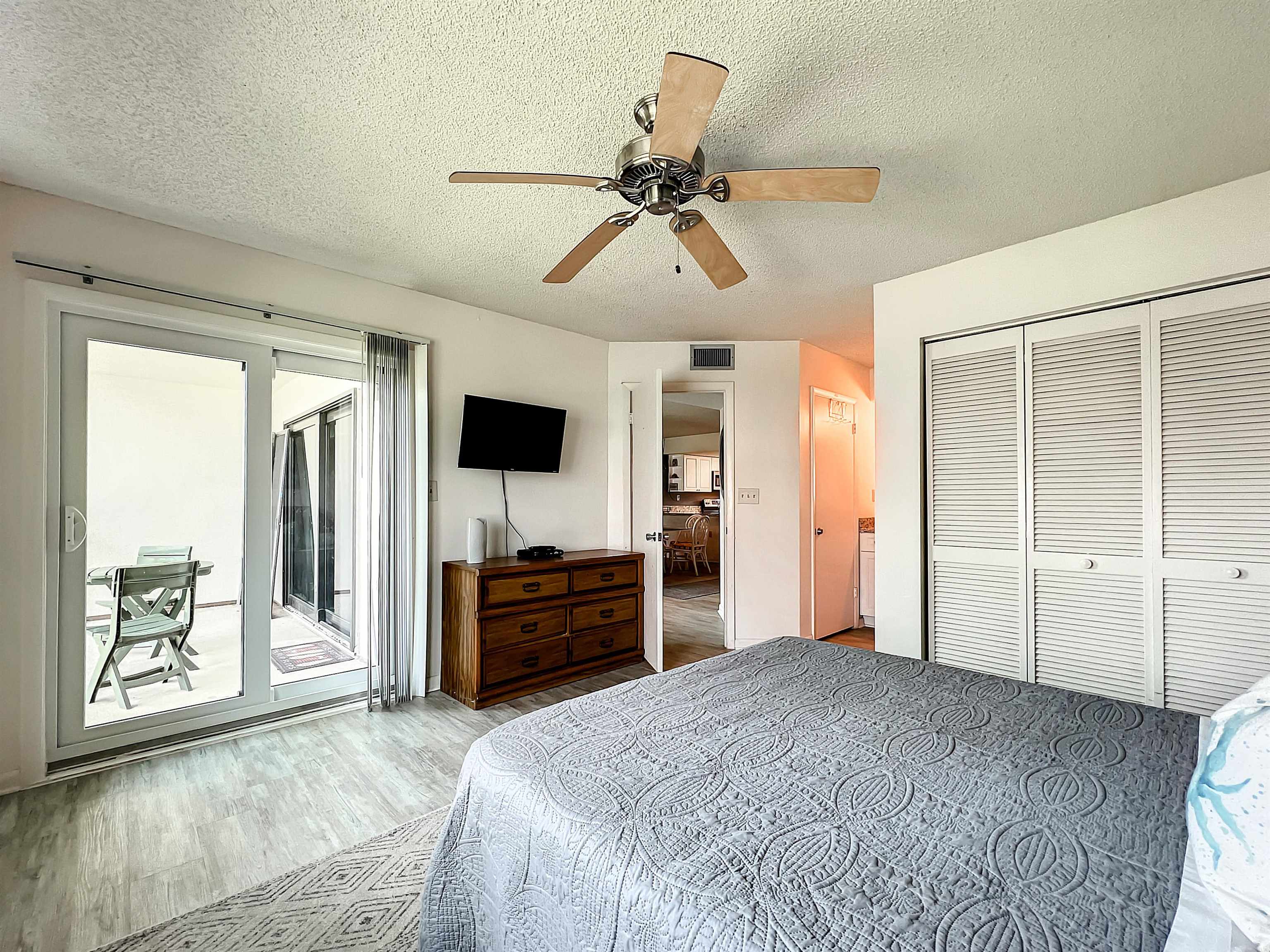 4250 A1A South, Unit O23 St. Augustine, FL 32080 - Photo 15 of 38 a bedroom with a bed and a flat screen tv