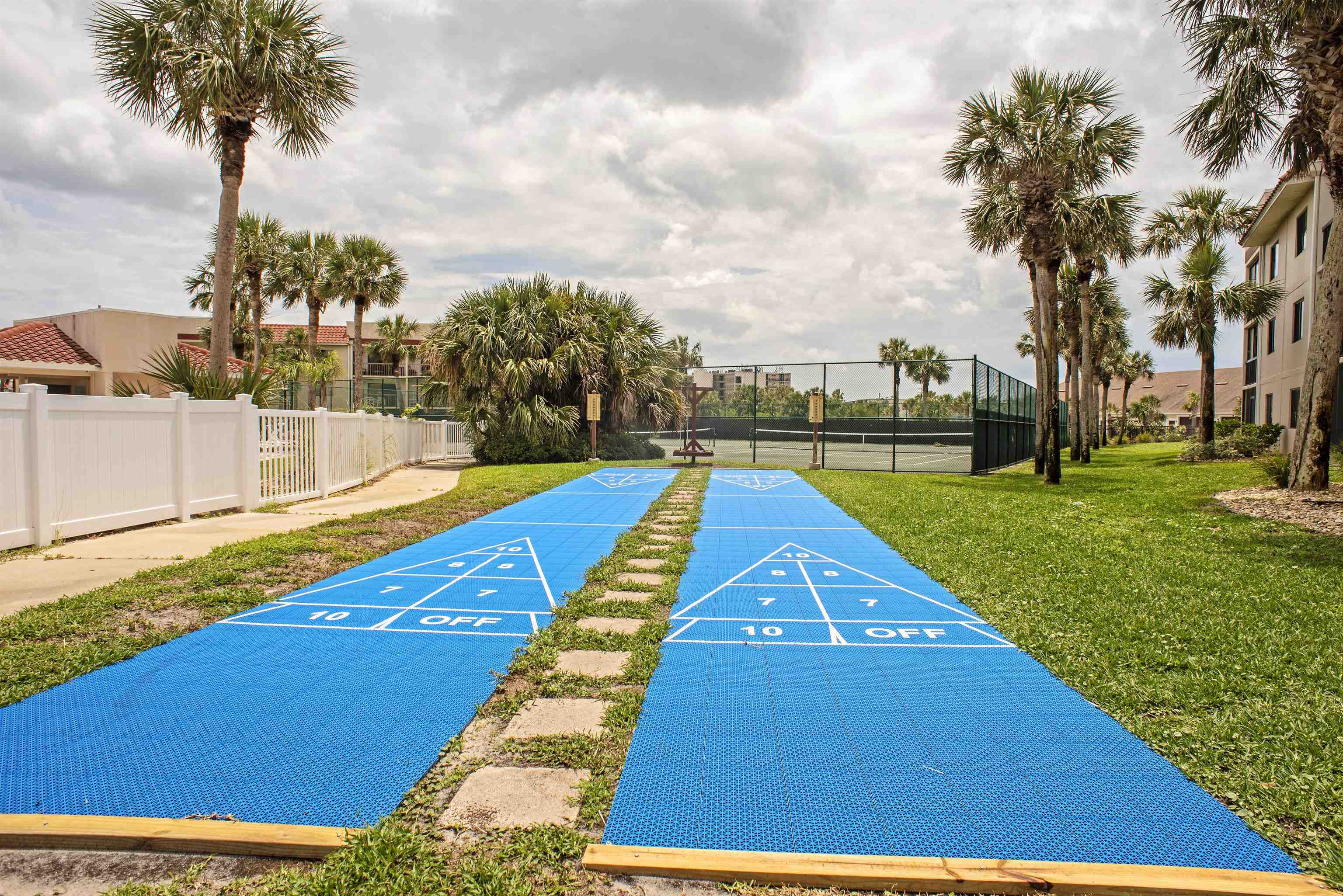 4250 A1A South, Unit O23 St. Augustine, FL 32080 - Photo 21 of 38 a view of swimming pool with a garden and trees