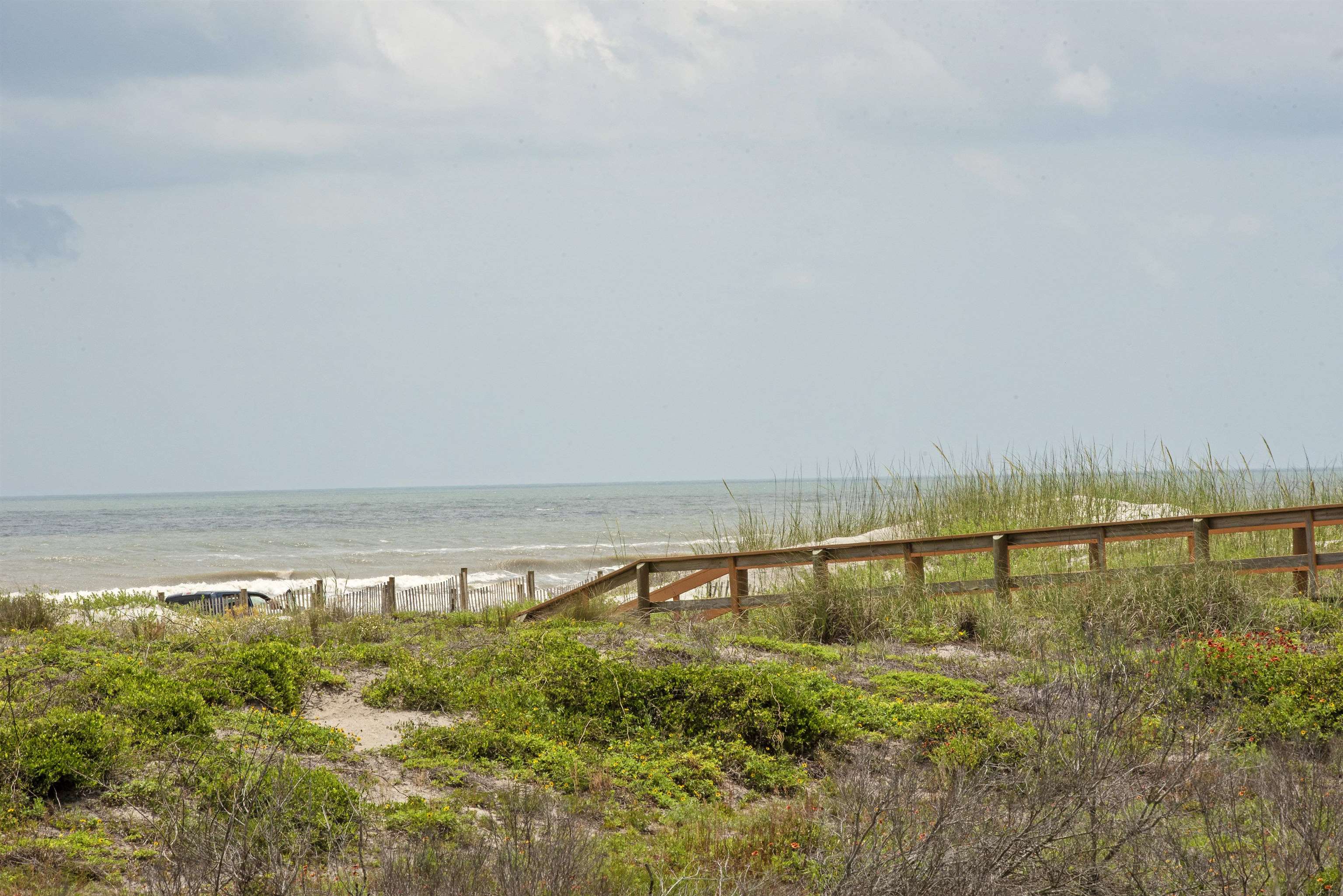 4250 A1A South, Unit O23 St. Augustine, FL 32080 - Photo 26 of 38 a view of ocean with a large bridge