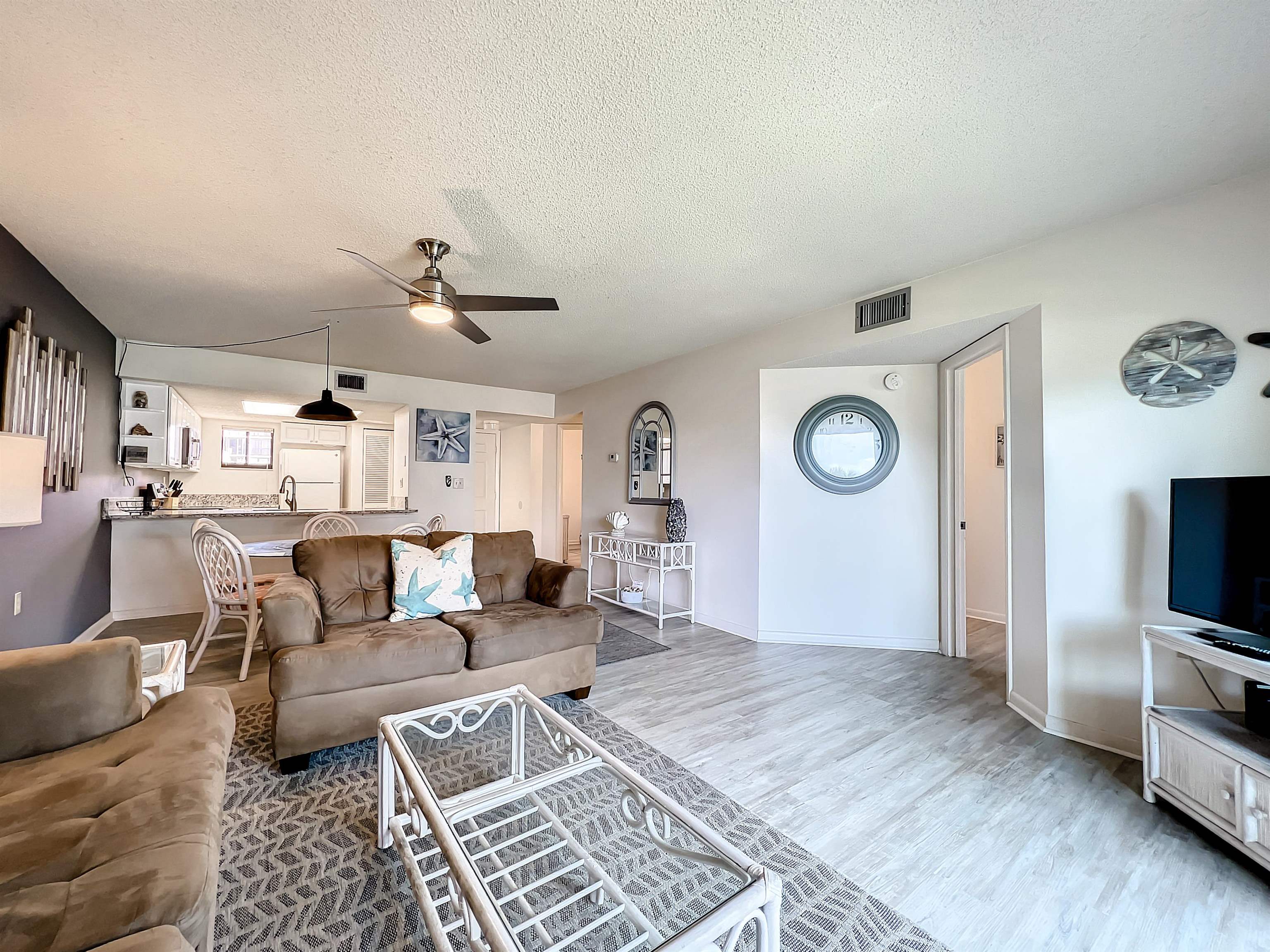 4250 A1A South, Unit O23 St. Augustine, FL 32080 - Photo 10 of 38 a living room with furniture and a flat screen tv