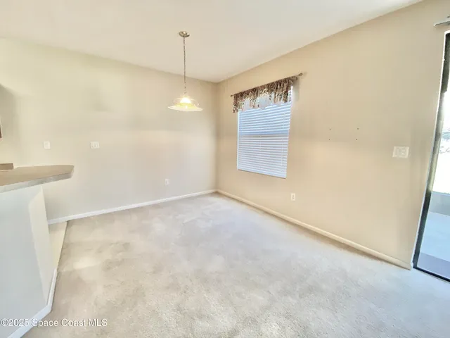 a workspace with furniture and window