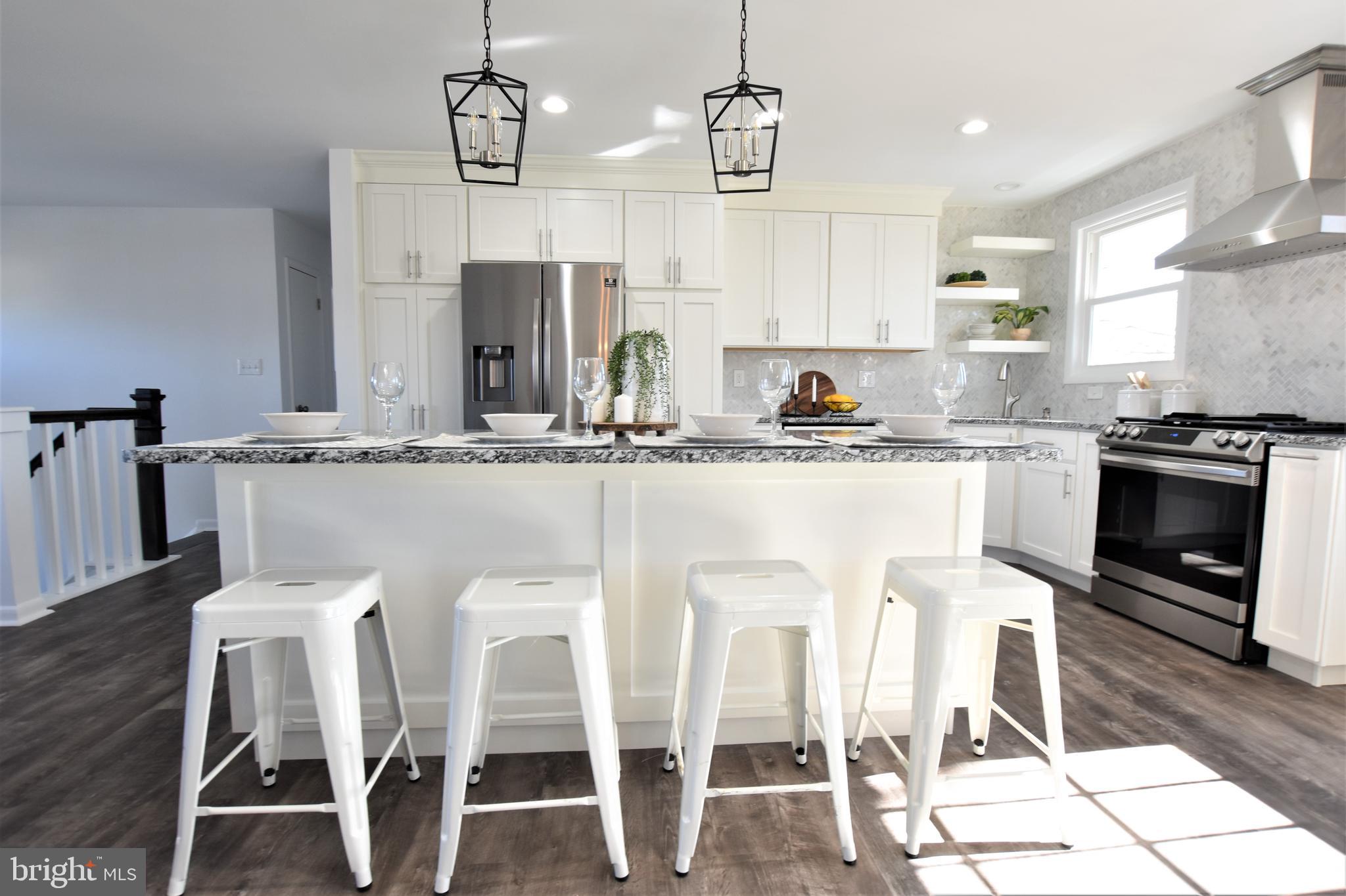2939 Northwind Road Baltimore, MD 21234 - Photo 5 of 19 Island with seating space