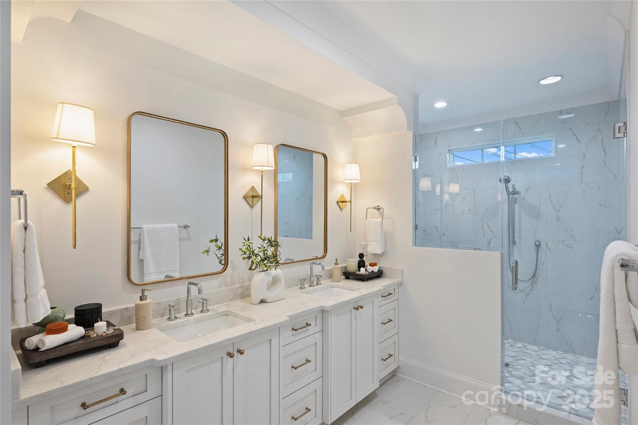 522 Greystone Road Charlotte, NC 28209 - Photo 15 of 23 a bathroom with double sink and a mirror