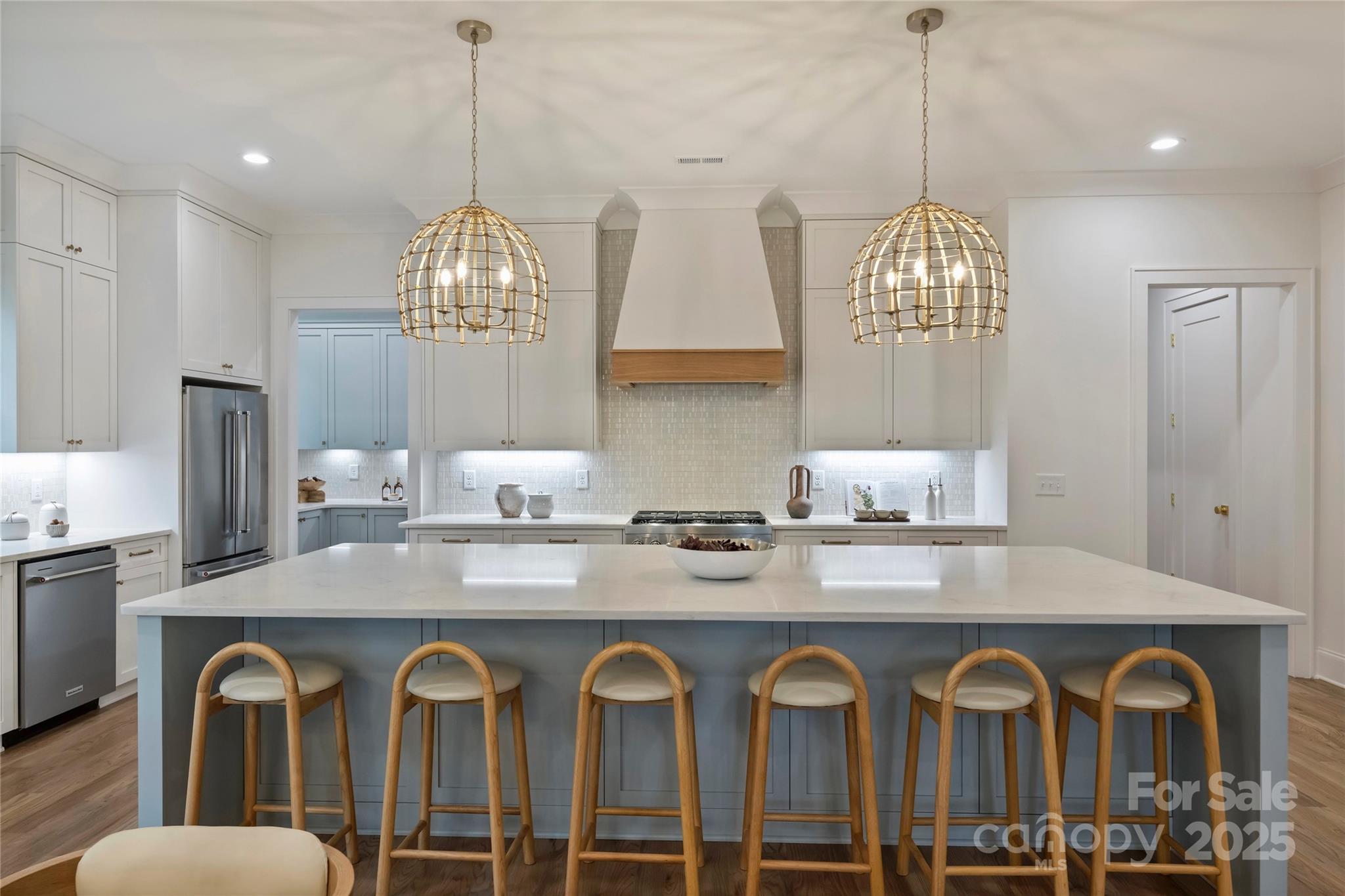 522 Greystone Road Charlotte, NC 28209 - Photo 2 of 23 a very nice looking kitchen with granite countertop a stove a sink a dining table and chairs
