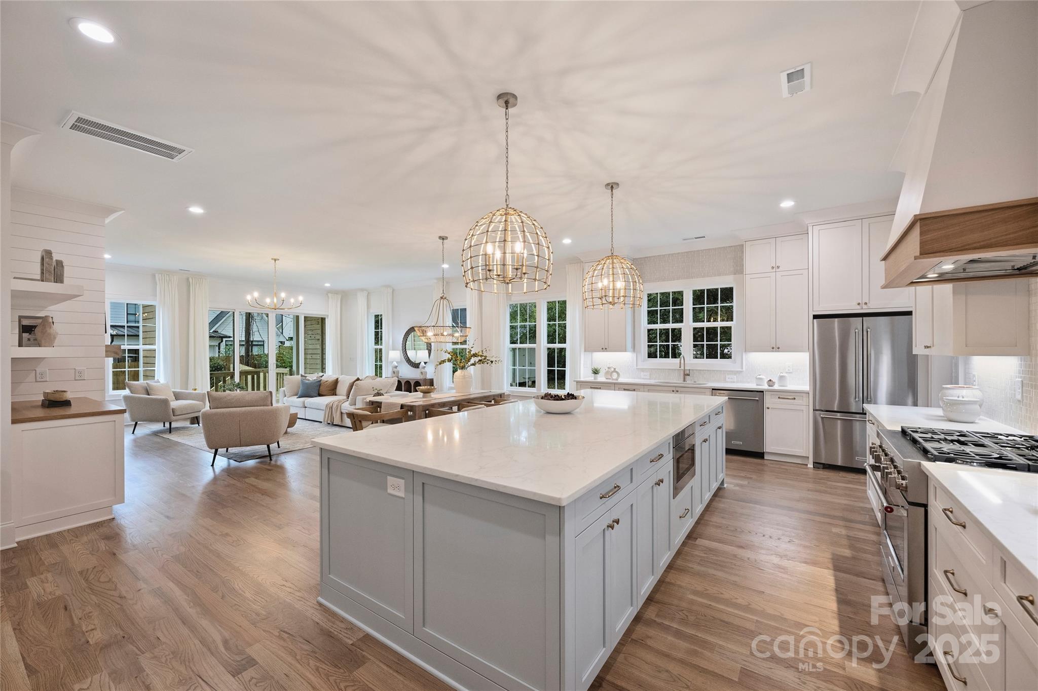 522 Greystone Road Charlotte, NC 28209 - Photo 3 of 23 a large kitchen with stainless steel appliances granite countertop a lot of counter space