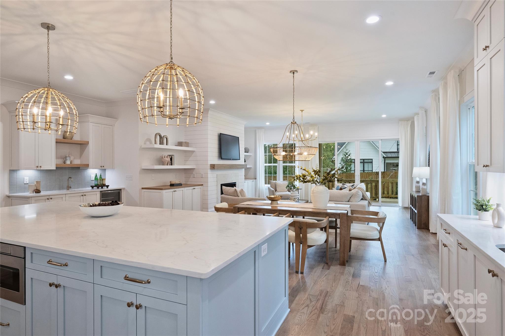522 Greystone Road Charlotte, NC 28209 - Photo 5 of 23 a kitchen with lots of counter space and chandelier