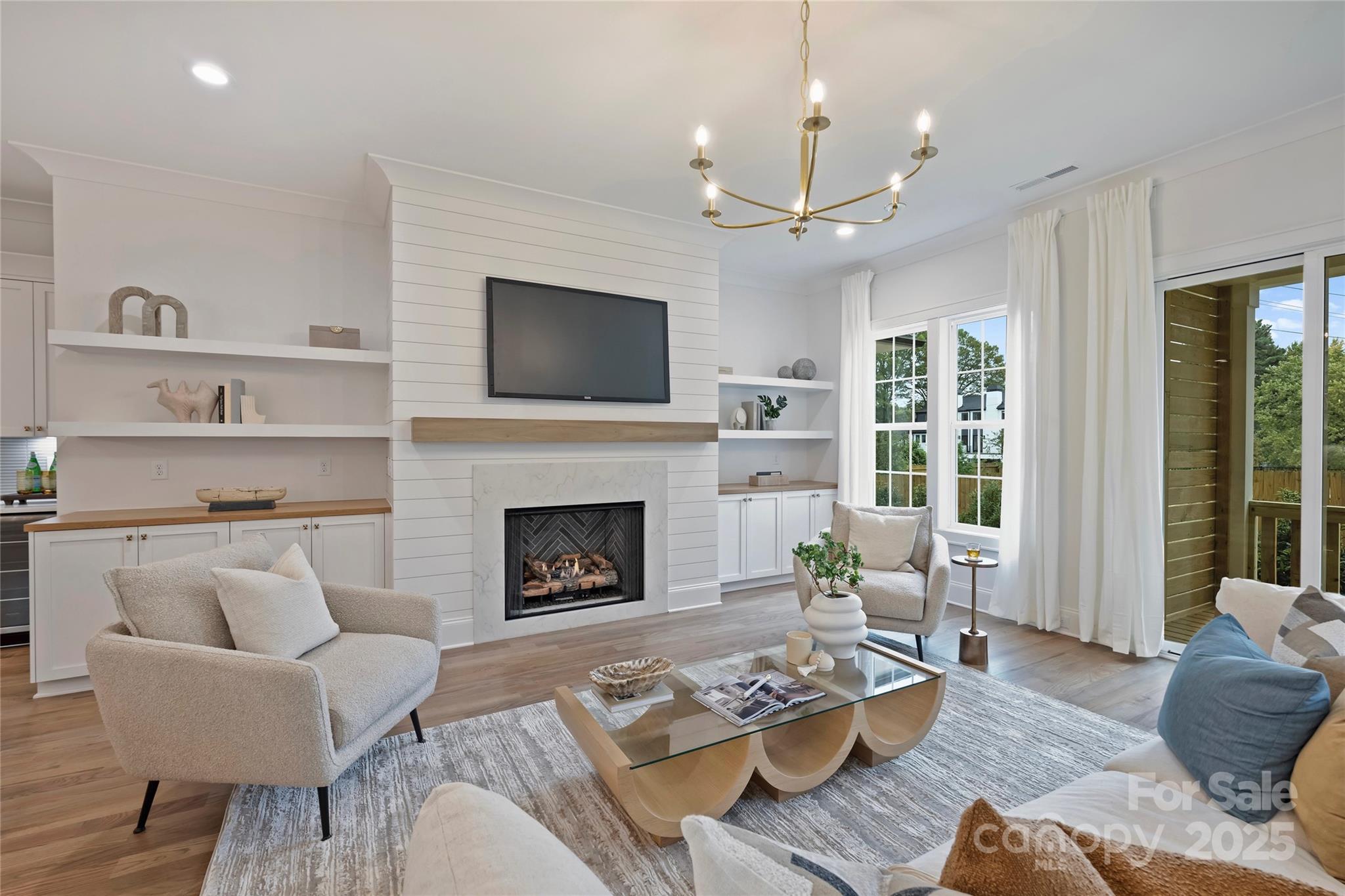522 Greystone Road Charlotte, NC 28209 - Photo 10 of 23 a living room with furniture fireplace and window