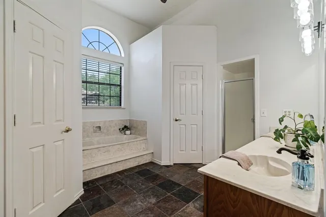 a bathroom with a sink and a bathtub