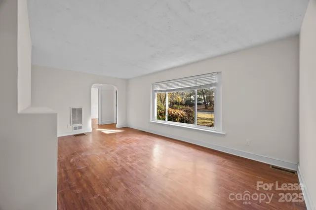 an empty room with window