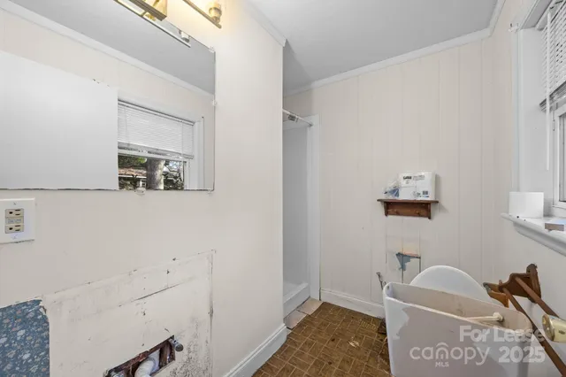 a bathroom with a sink and bathtub