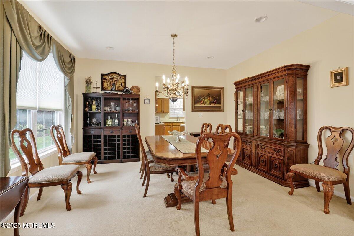 508 Lanzaro Drive Morganville, NJ 07751 - Photo 12 of 48 a view of a livingroom with furniture window and wooden floor