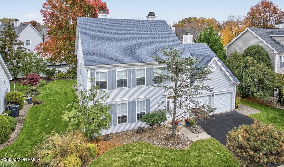 508 Lanzaro Drive Morganville, NJ 07751 - Photo 2 of 48 front view of a house with a yard