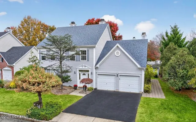 an aerial view of a house with a garden
