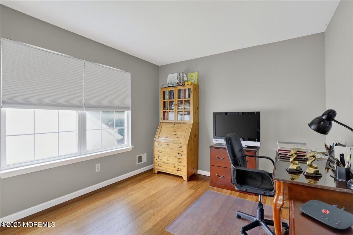 508 Lanzaro Drive Morganville, NJ 07751 - Photo 35 of 48 a view of a workspace with furniture and a window
