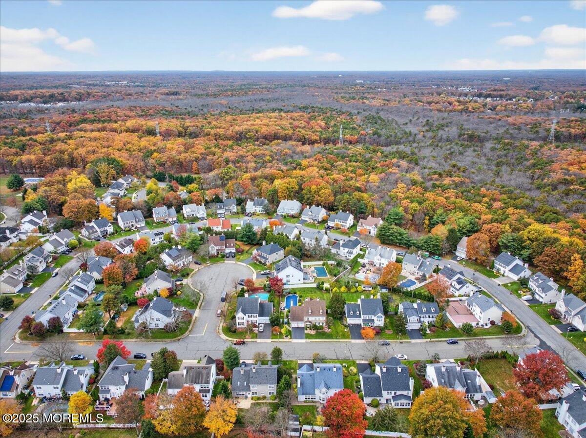 508 Lanzaro Drive Morganville, NJ 07751 - Photo 47 of 48 an aerial view of residential houses with outdoor space