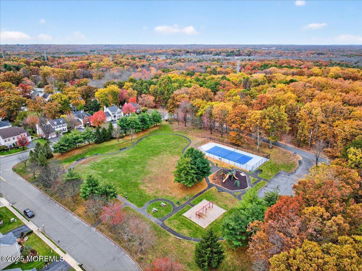 508 Lanzaro Drive Morganville, NJ 07751 - Photo 48 of 48 an aerial view of residential houses with outdoor space