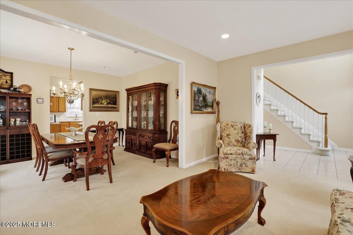 508 Lanzaro Drive Morganville, NJ 07751 - Photo 10 of 48 a view of a livingroom with furniture and a dining table