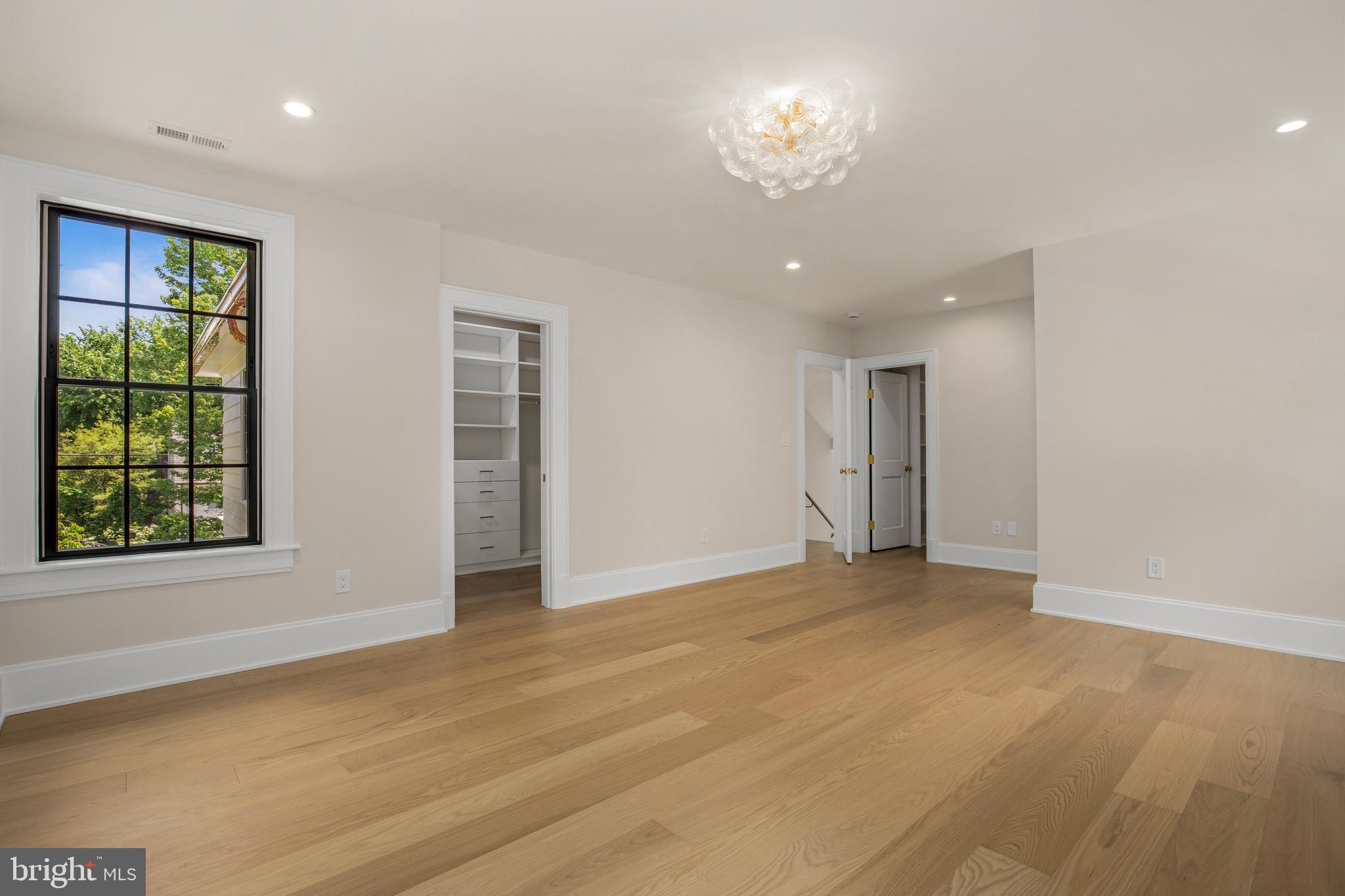 2710 36th Street Northwest Washington, DC 20007 - Photo 16 of 29 a view of an empty room with a window