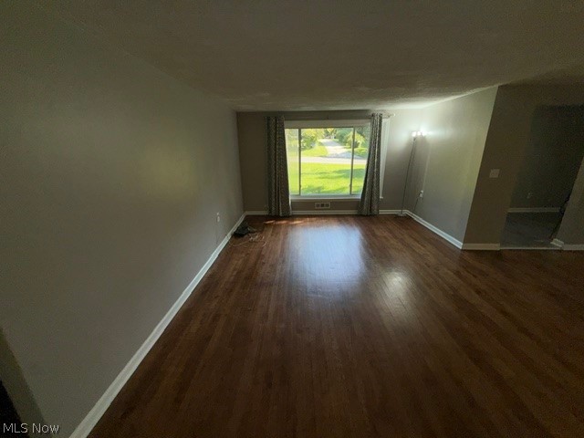 Wood-finish flooring with baseboard trim