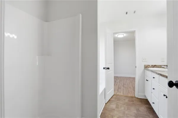 a view of a hallway with closet
