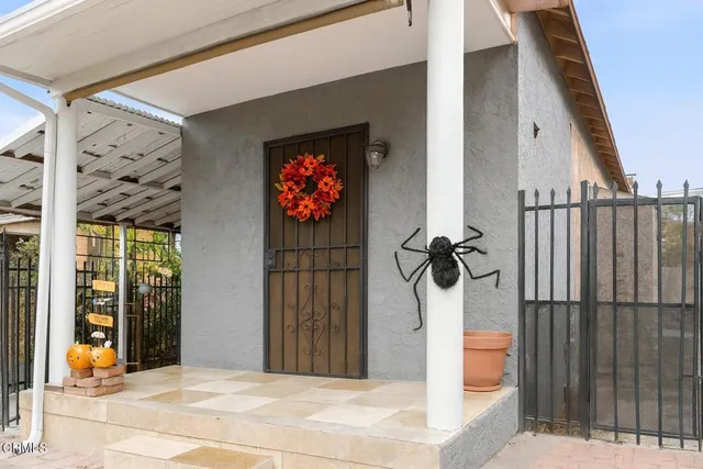 a view of a entryway door front of house