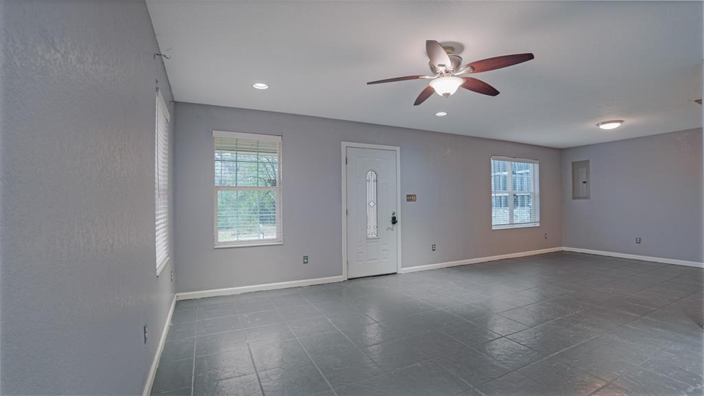 1312 West Connally Street Tyler, TX 75701 - Photo 5 of 33 a view of an empty room with a window