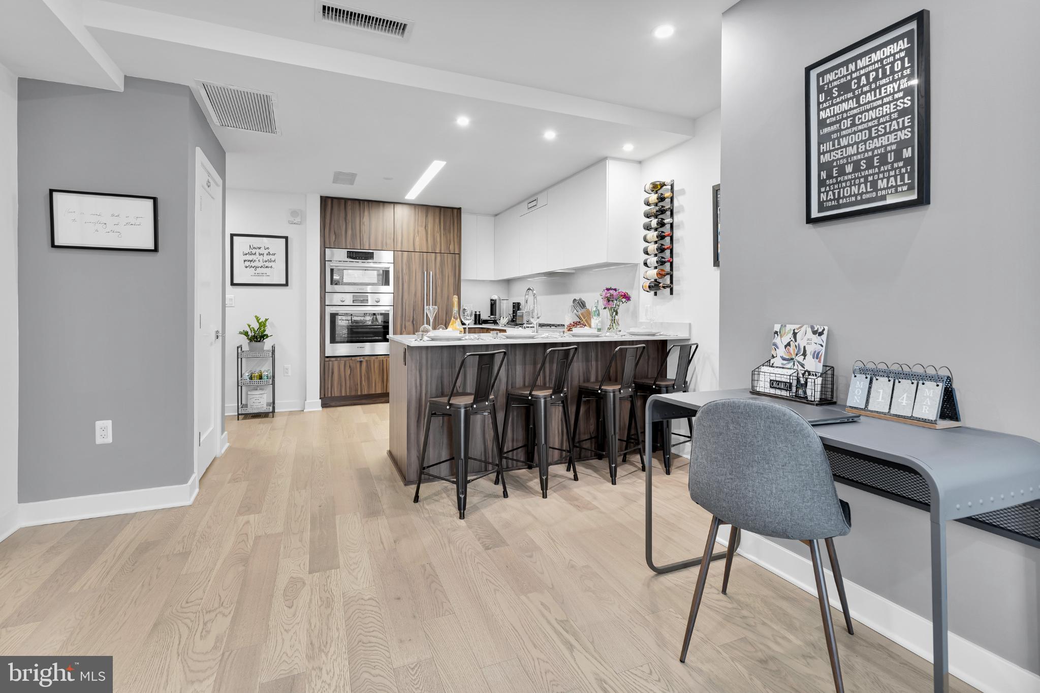37 L Street Southeast, Unit 308 Washington, DC 20003 - Photo 18 of 43 a view of a dining room with furniture