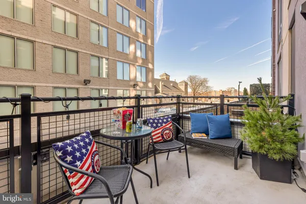 a view of a chairs and table in the terrace