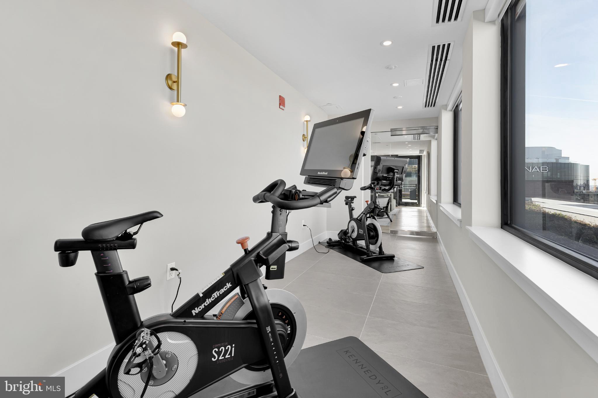 37 L Street Southeast, Unit 308 Washington, DC 20003 - Photo 28 of 43 a view of a room with gym equipment