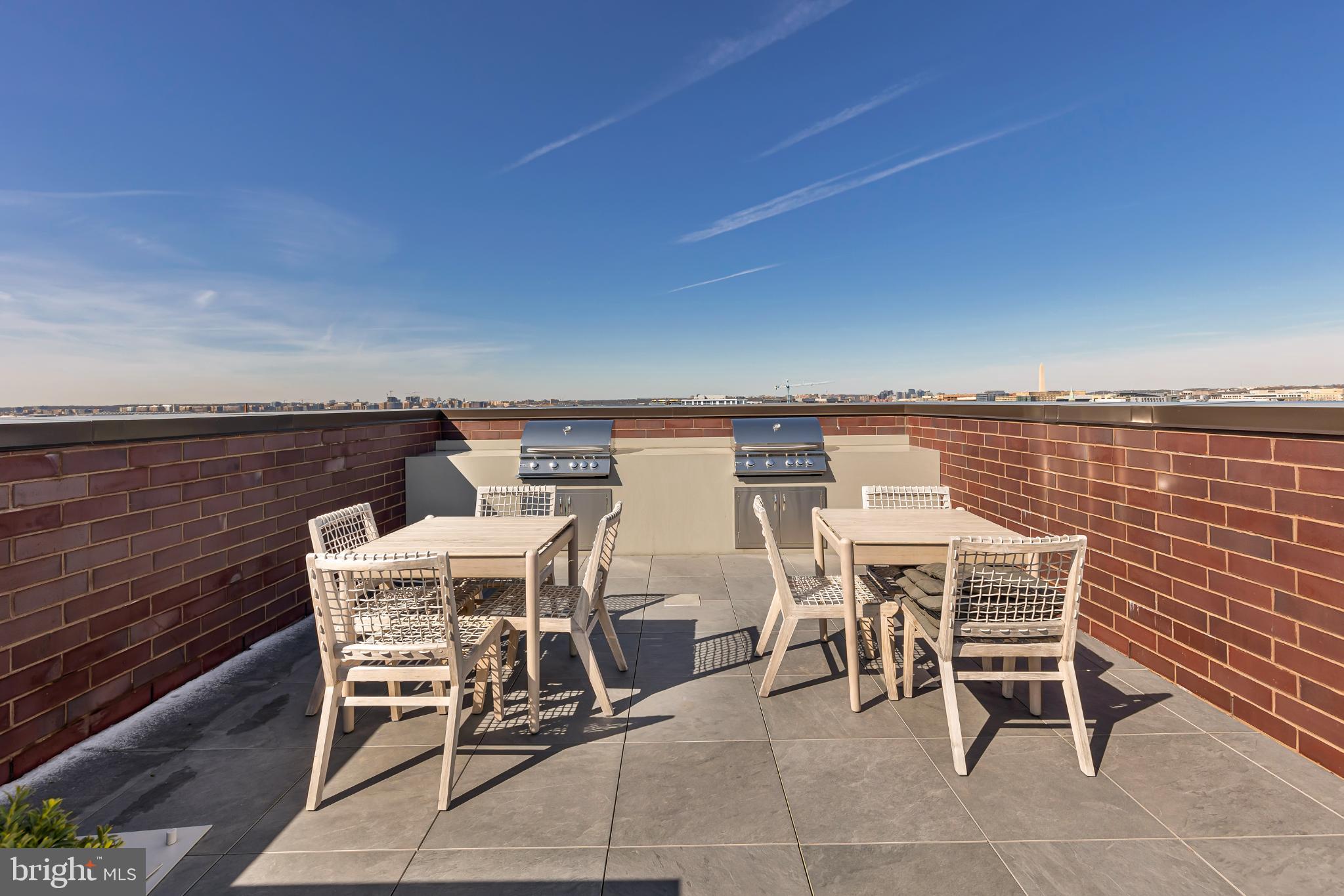 37 L Street Southeast, Unit 308 Washington, DC 20003 - Photo 33 of 43 a view of a terrace with sitting area