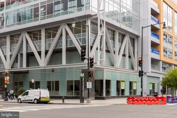 a view of swimming pool with outdoor seating and yard