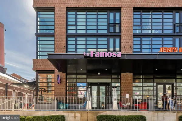 a view of a building with a street