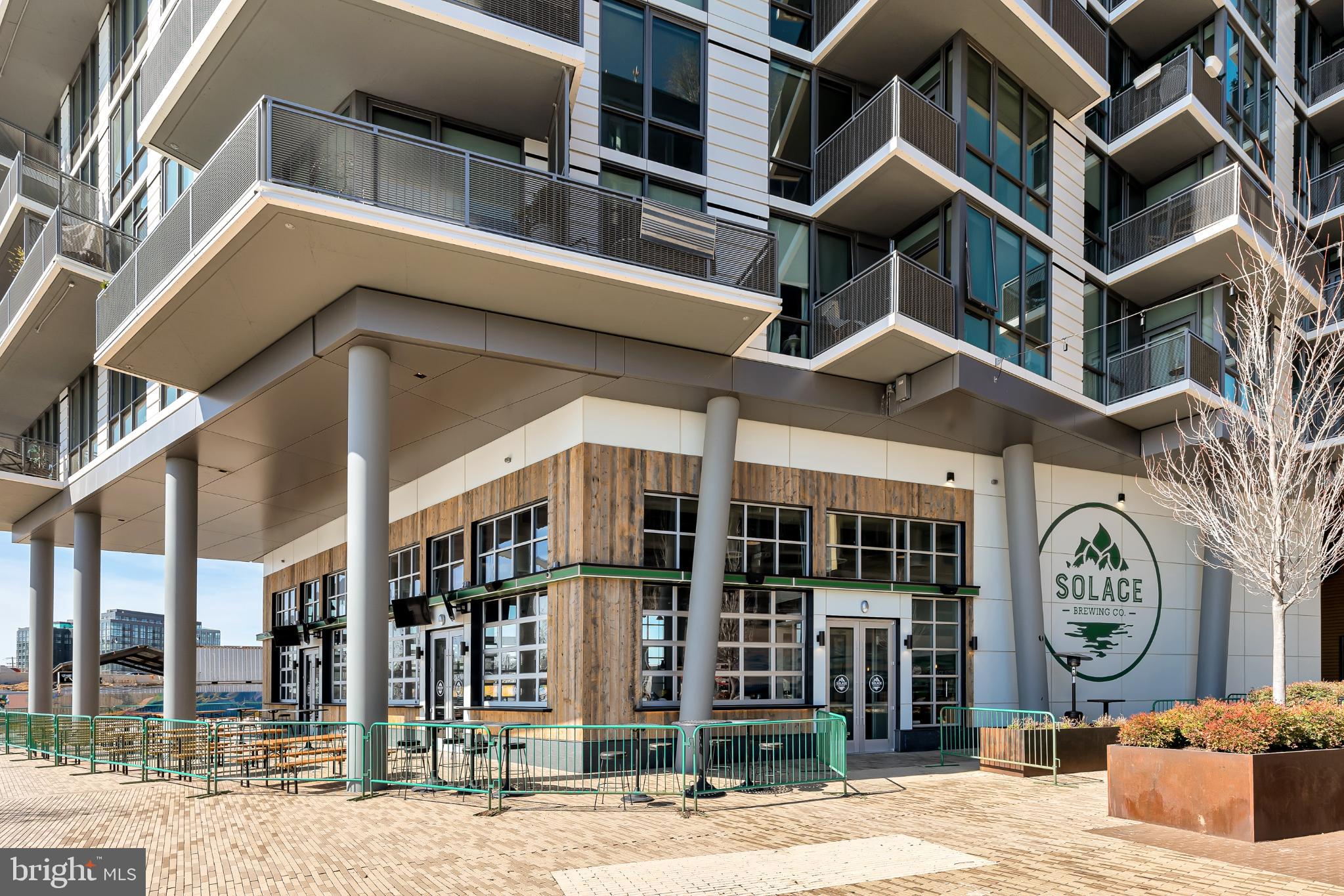 37 L Street Southeast, Unit 308 Washington, DC 20003 - Photo 42 of 43 a view of a building with a door and windows