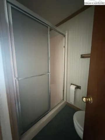 a bathroom with a sink and toilet
