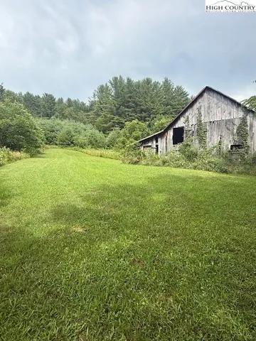 a view of a garden and basketball court