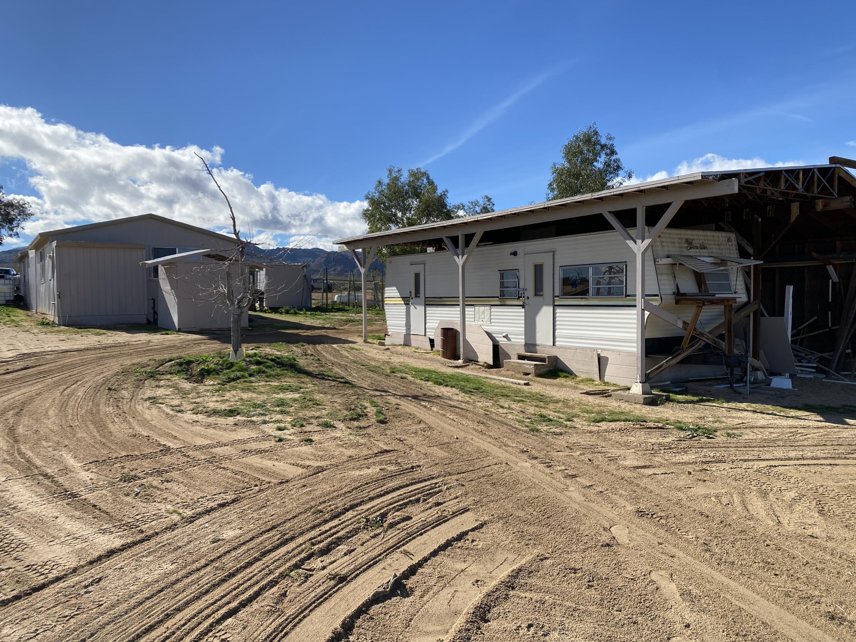 52020 Joshua Tree Road Johnson Valley, CA 92285 - Photo 36 of 48 a house view with a backyard space