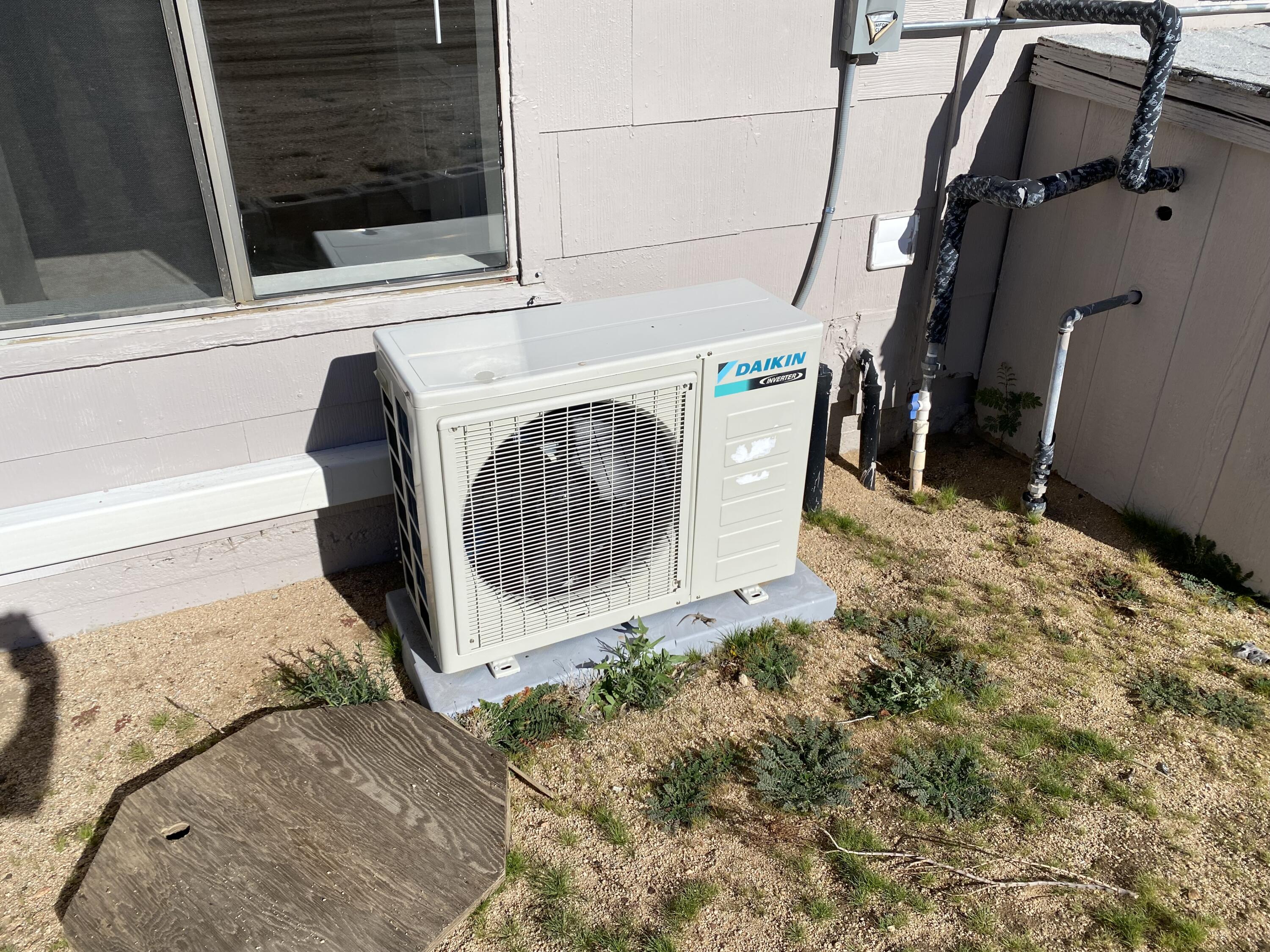 52020 Joshua Tree Road Johnson Valley, CA 92285 - Photo 40 of 48 a utility room with a washer and dryer