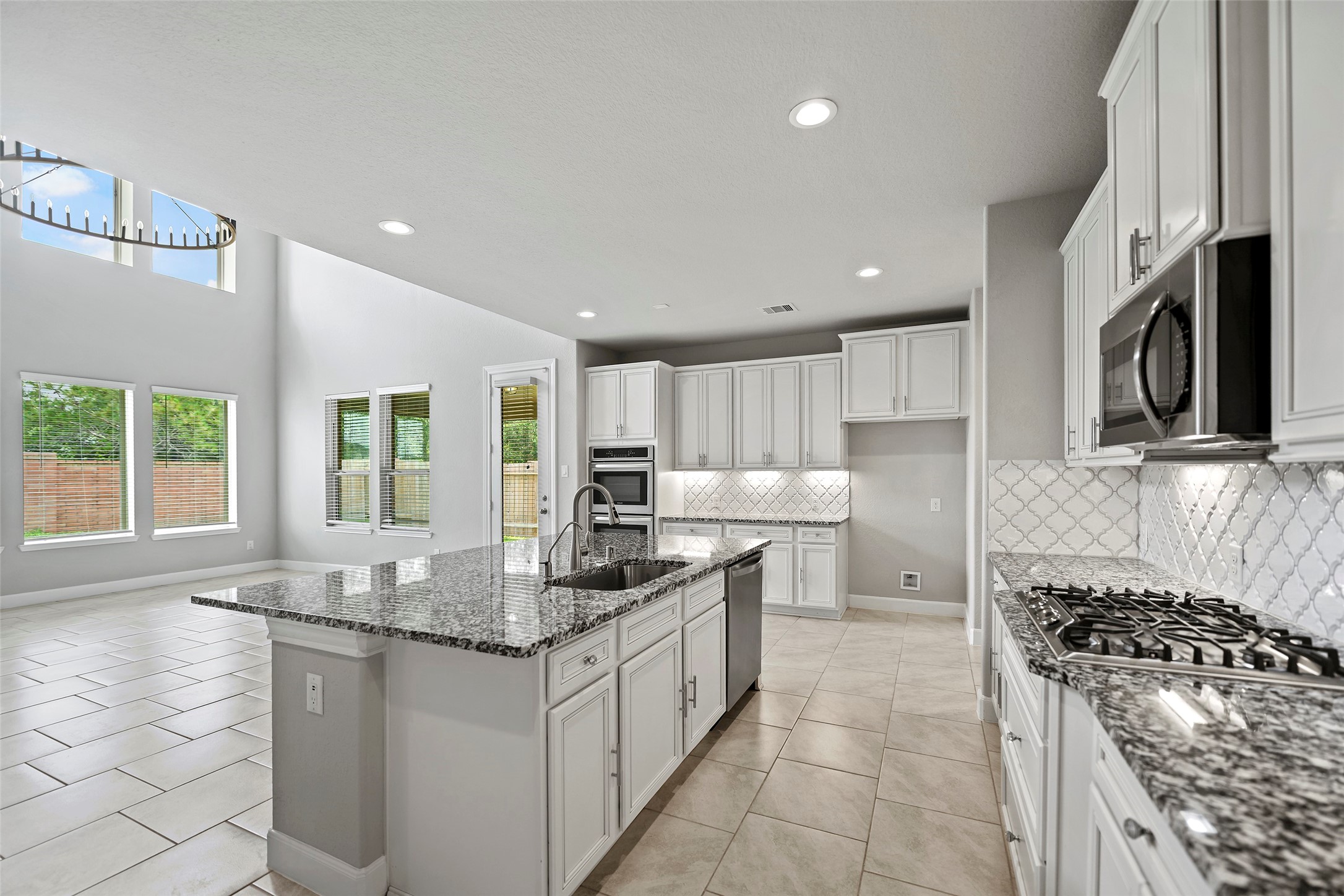 5839 Metaphor Way Rosenberg, TX 77469 - Photo 14 of 50 Chef inspired gourmet kitchen. Perfect for entertaining for large crowd.