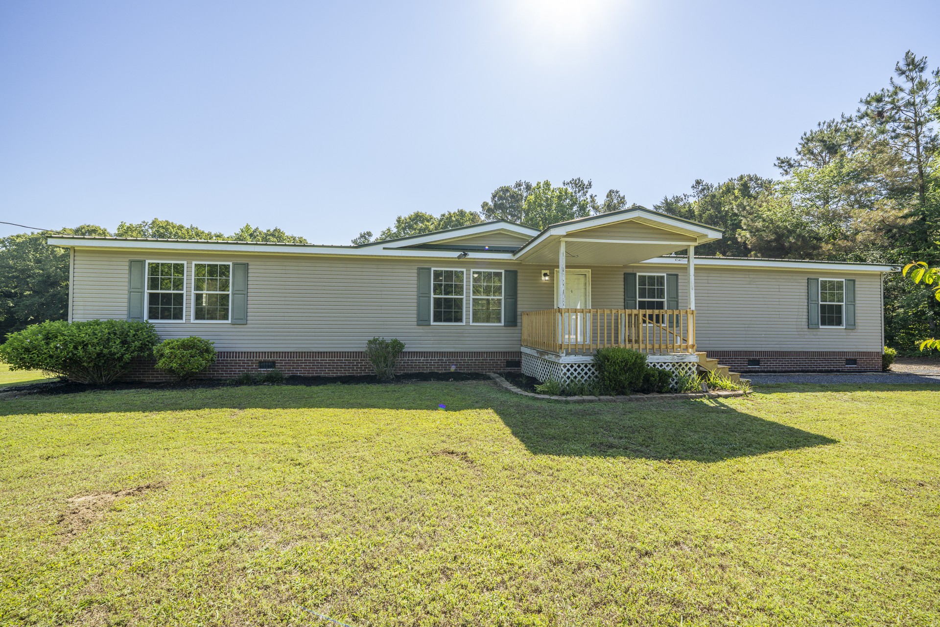 1125 Clifft Road Bolivar, TN 38008 - Photo 55 of 78 a front view of house with yard and green space