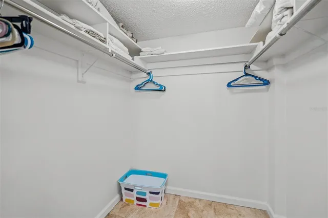 a bathroom with a sink a toilet and shower curtain