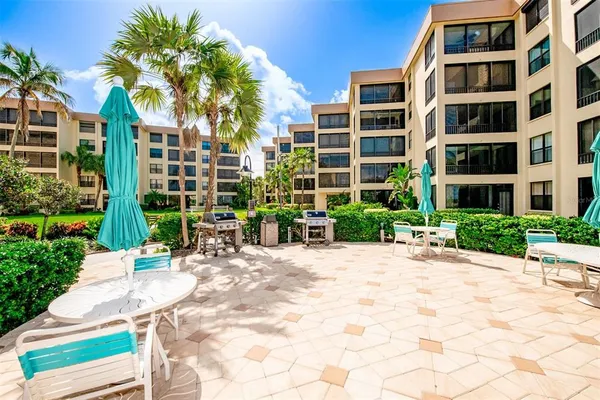 a view of a terrace with sitting area
