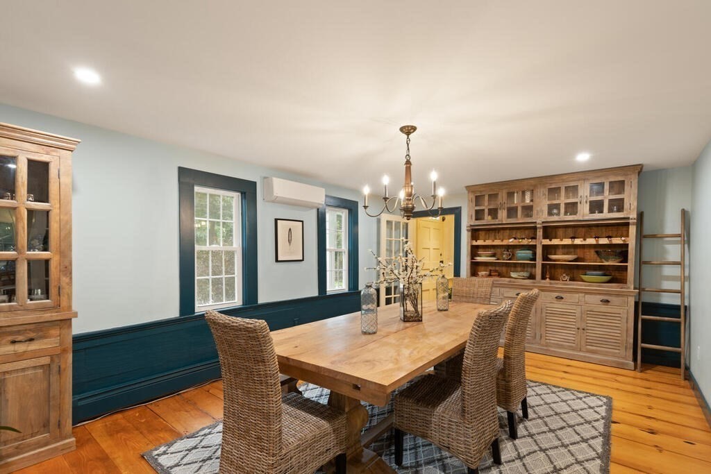 6 Lawrence Road Boxford, MA 01921 - Photo 15 of 42 a view of a dining room with furniture