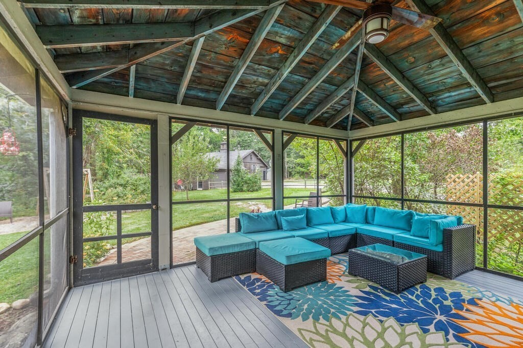 6 Lawrence Road Boxford, MA 01921 - Photo 16 of 42 a balcony with furniture and wooden floor