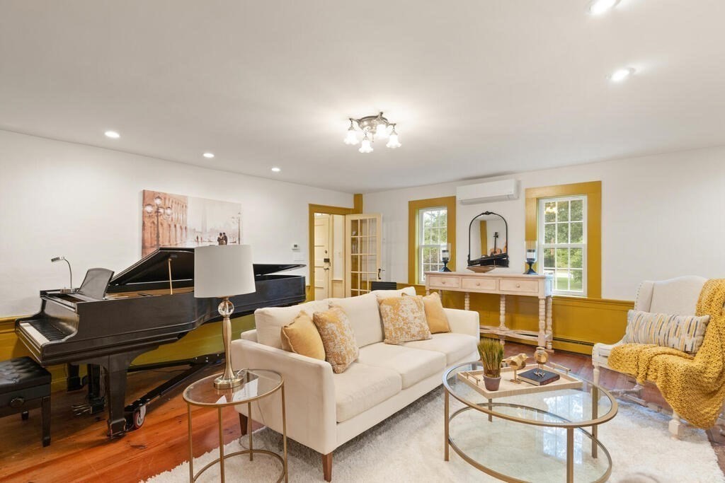 6 Lawrence Road Boxford, MA 01921 - Photo 18 of 42 a living room with furniture a ceiling fan and a window