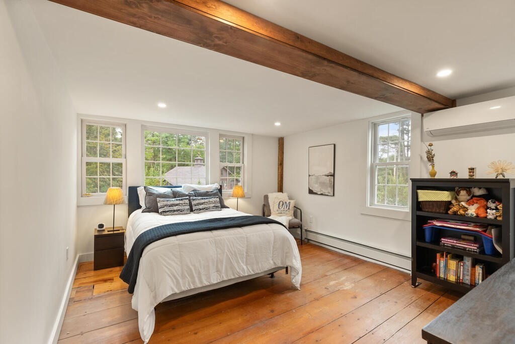 6 Lawrence Road Boxford, MA 01921 - Photo 25 of 42 a bed sitting in a spacious bedroom next to a window