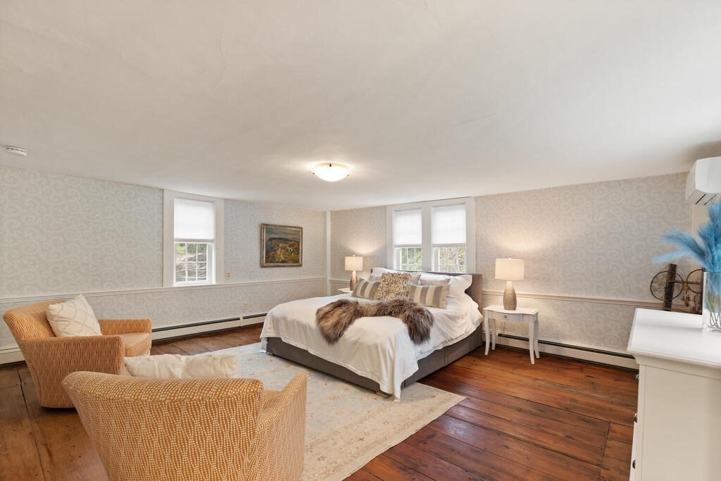 6 Lawrence Road Boxford, MA 01921 - Photo 28 of 42 a bedroom with furniture and a wooden floor