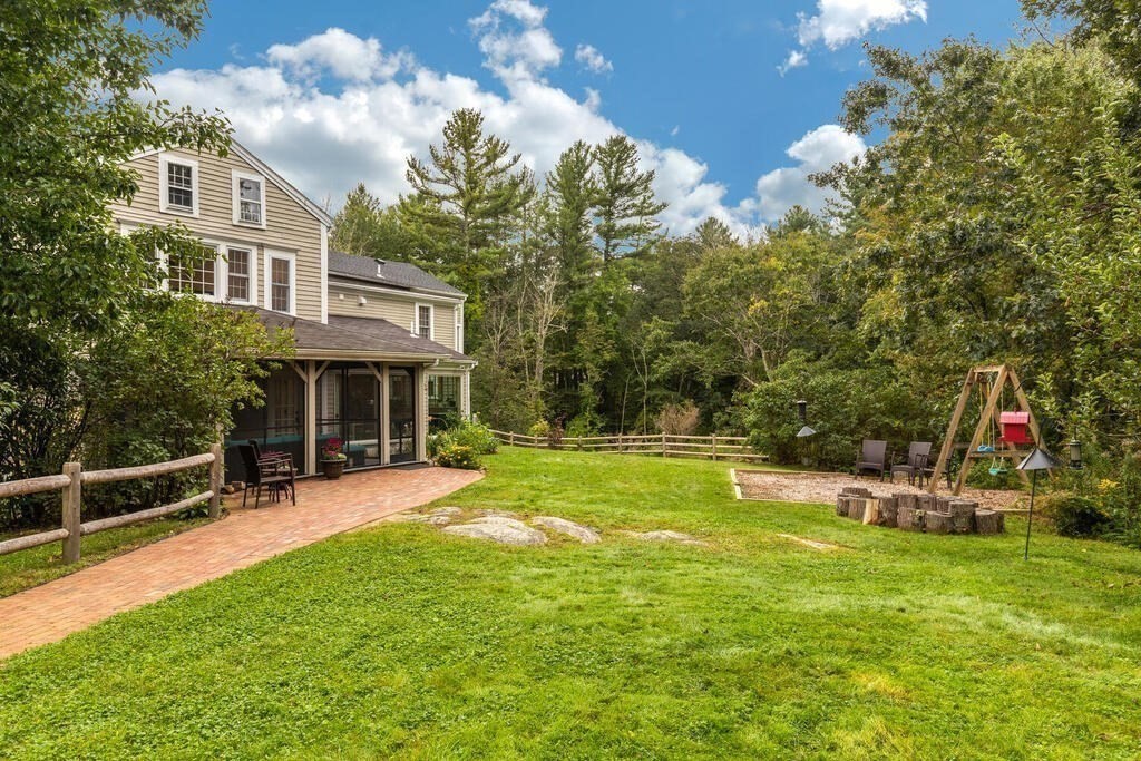 6 Lawrence Road Boxford, MA 01921 - Photo 37 of 42 a view of a house with a yard and sitting area