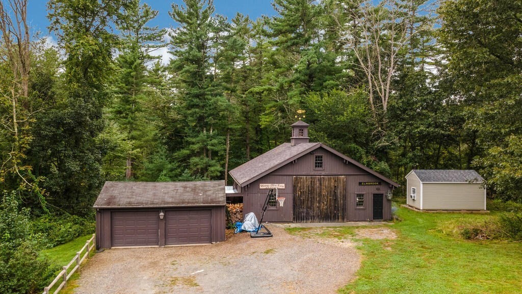 6 Lawrence Road Boxford, MA 01921 - Photo 38 of 42 a front view of a house with a yard and trees
