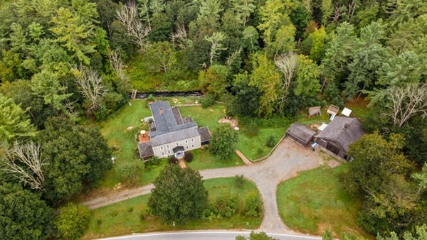6 Lawrence Road Boxford, MA 01921 - Photo 39 of 42 an aerial view of a house with a yard and trees